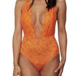 We Are HAH  Comin’ In Haht Lace Bodysuit in Burnt Orange Size S Photo 0