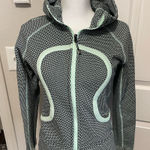 Lululemon Scuba Black and Mint Sweater size 6 Photo 0