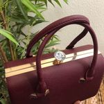 Burgundy Maroon red Hard shell leather hand bag purse satchel gold hardware faux diamond kiss lock Approx 11” wide x 8” tall x 6” deep Photo 1