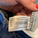 Universal Threads Universal Thread high rise skinny jeans raw hem size 27/4 Photo 8