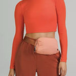 Lululemon Everywhere Belt Bag Crossbody Salmon Orange Small Versatile Pouch Photo 0