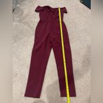 Adelyn Rae Red Crepe Twisted Off-Shoulder neckline Straight Leg Jumpsuit Photo 4