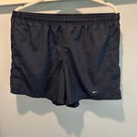 ladies black active wear shorts Nike logo size small(4-6) Photo 1