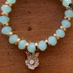Juicy Couture  Stretch Blue/Teal Beaded Charm Bracelet with Dangling Flower Charm Photo 1