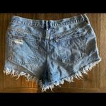 We The Free high waisted distressed raw edge hem denim shorts size 31 Photo 1