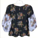 Ann Taylor Loft black floral top contrasting print on balloon sleeve
Size Small Photo 6