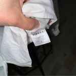 XiRENA Callie Blouse long sleeve ruffle button down shirt poplin White Photo 7