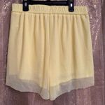 Free People Movement Double Vision Yellow Mesh Athletic Long Shorts Small NWOT Photo 1