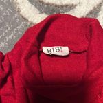 Bibi red sweater. Has one cold shoulder Size M Photo 2