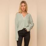 Hem & Thread Grommet Detailed Rib Top Photo 1