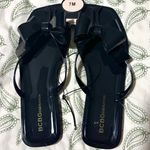 BCBGeneration  Glossy Black Jelly Bow Sandals Shoes Lima 7 NWT Photo 1