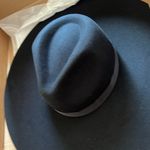 Lack of Color  Black Hat Photo 1