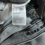 American Eagle  Next Level Stretch High Rise Light Gray Denim Distressed Jeans 0 Photo 5