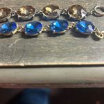 Pair of Blue and Brown Gemstone Bracelets Photo 2