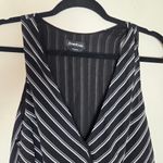 Bebe Black and White Striped Sleeveless Bodysuit Photo 1