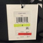 Calvin Klein black cut out dress with white lining. NWT. Photo 8