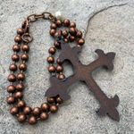 Boutique Copper ball chain with metal cross and a Pearl bead in the center. Photo 2