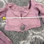 Urban Outfitters seamless purple top size Xs Has key hole design and stretches Photo 2