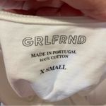 GRLFRND Eryka Long Sleeve Jersey Knit Paddle Thong Bodysuit in White Photo 12