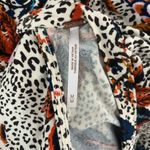 Free People  Hear Me Roar Animal Print Floral Keyhole Short Sleeve Top Medium Photo 2