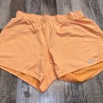 Nike Orange Athletic Shorts Photo 0