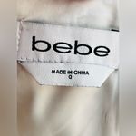 Bebe  striped off-shoulder dress.  Size 0 please the pictures for the measurement Photo 8