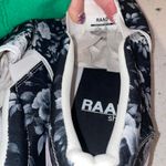 Raad  Black & white rose slide on sneakers  size 11.5  Brand New - never worn  Smoke Free Dog Friendly home  Retail $104 Photo 2