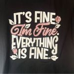 Wound Up  Black Tee with Pink and White Design Photo 1