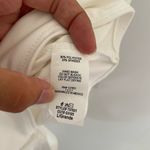 NWT Live in the moment White Body Suit size large with small cut out Photo 5
