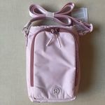 Lululemon  Water Bottle Crossbody Bag with Front Pocket 2L - Blissful Pink Photo 0