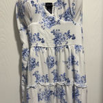 Justify White dress with blue flowers Photo 0