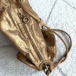 DKNY Vintage  Metallic Gold Leather Backpack Purse Drawstring Shoulder Bag Photo 6