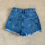 Primark  high rise blue distressed jean shorts in size 0 Photo 1