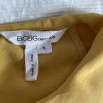 BCBGeneration Cute gold sleeveless BCBG dress Photo 4