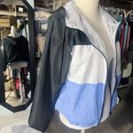 Aeropostale $68 Aéropostale SPORT renew you raincoat blue white black full zip pockets NWT elastic long sleeves New with tag Same day shipping Smoke and pets free Stay dry and stylish with this Aéropostale SPORT renew you raincoat in a bold blue, white, and black color scheme. This short-length jacket is perfect for any active woman who loves outdoor sports and activities. The full zip design and convenient pockets make this raincoat both practical and fashionable. Made of high-quality polyester, this raincoat is sure to stand up to the elements and keep you comfortable all day long. And with its sporty theme, it's the perfect addition to any athletic wardrobe. Don't let the weather stop you from doing what you love - grab this Aéropostale SPORT raincoat today! Photo 5