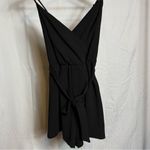 Active USA Black Jumpsuit with Wrap V-Neck and Tie Waist Photo 1