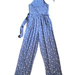 American Eagle OMG How cute is this jumpsuit, blue with small white flowers, smocked halter top, matching belt, has side hand pockets, excellent condition, size small Photo 5