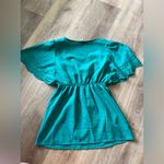 Speechless  Teal Top. Size small. Photo 3