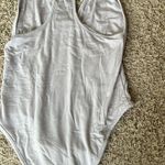 Revolve Sasha Minimalist Neutral Taupe Cut Out Bodysuit Photo 4