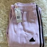 Adidas NWT


Women's Tiro Cut 3-Stripes Fleece
Joggers Photo 5