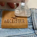 Hollister  Light Wash Distressed Ripped Raw Hem Ultra High Mom Denim Shorts Photo 4