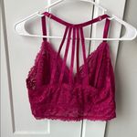 Torrid  strappy back bralette in color berry. Size 1. NWT. Photo 4