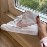 Nike  blazer sneakers girls size 5.5. Only wore once minor, flaw besides that in perfect condition. Color:light pink/white  Photo 4