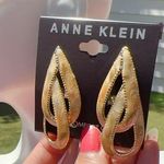 Anne Klein gold tone beige cream reflective amber double cross teardrop earrings Photo 0