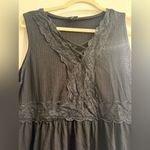 Torrid Black Babydoll Textured Jersey V-Neck Lace-Up Lace Pieced Top - size 1 Photo 1