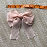 Light pink Clip on hair Bow Photo 2