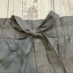 Socialite  Black High Waisted Tie Front Pocket Shorts. Size Large. Photo 8