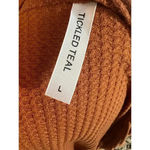Tickled Teal  the Aubrey cardigan orange waffle texture, side length size large Photo 9