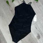 Holipick NWT One Piece High
Neck Criss
Cross Swimsuit Tummy black XS Photo 1