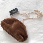 Forever 21 New Grossi faux fur handbag/crossbody bag from Photo 0